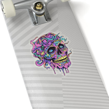 Skateboard deck with colorful psychedelic skull sticker and silver truck.