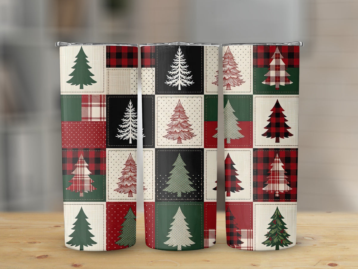 Three tumblers featuring a patchwork design of Christmas trees and holiday patterns.