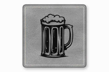 A square gray leather coaster features a black-and-white illustration of a foamy beer mug.
