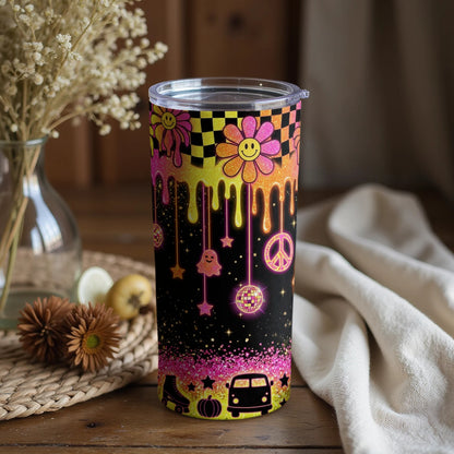 Tumbler with colorful retro smiley flowers, peace signs, disco balls, and a van.