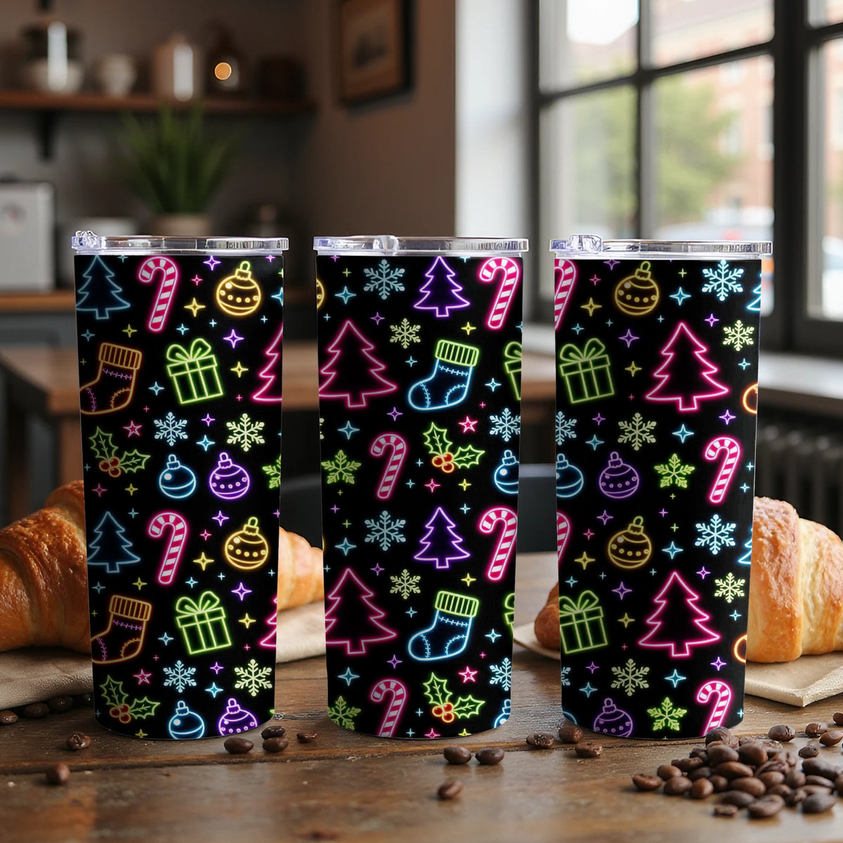 Three tumblers with a black background and neon Christmas pattern.