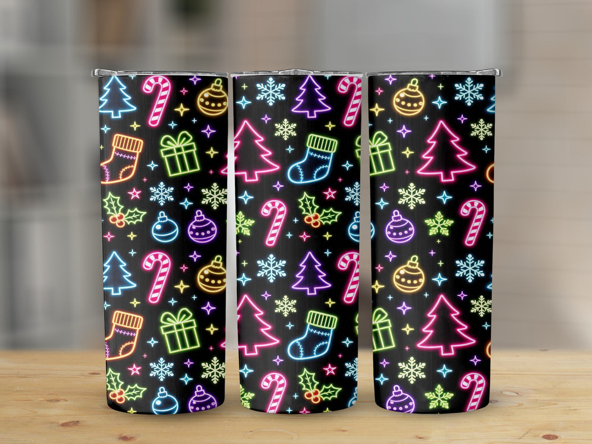 Three tumblers with a black background featuring neon Christmas patterns.