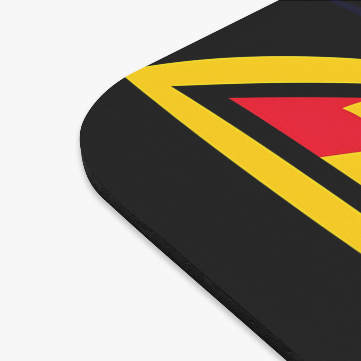 Mousepad with black, yellow, and red geometric design.