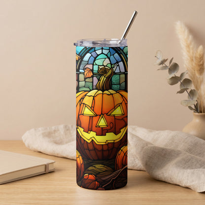 Stainless steel tumbler with stained glass pumpkin design and metal straw.