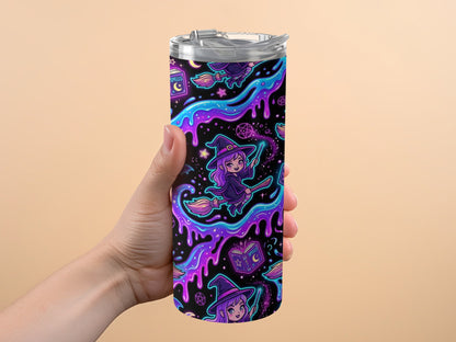 Tumbler with purple witch illustration, brooms, and spell book pattern.