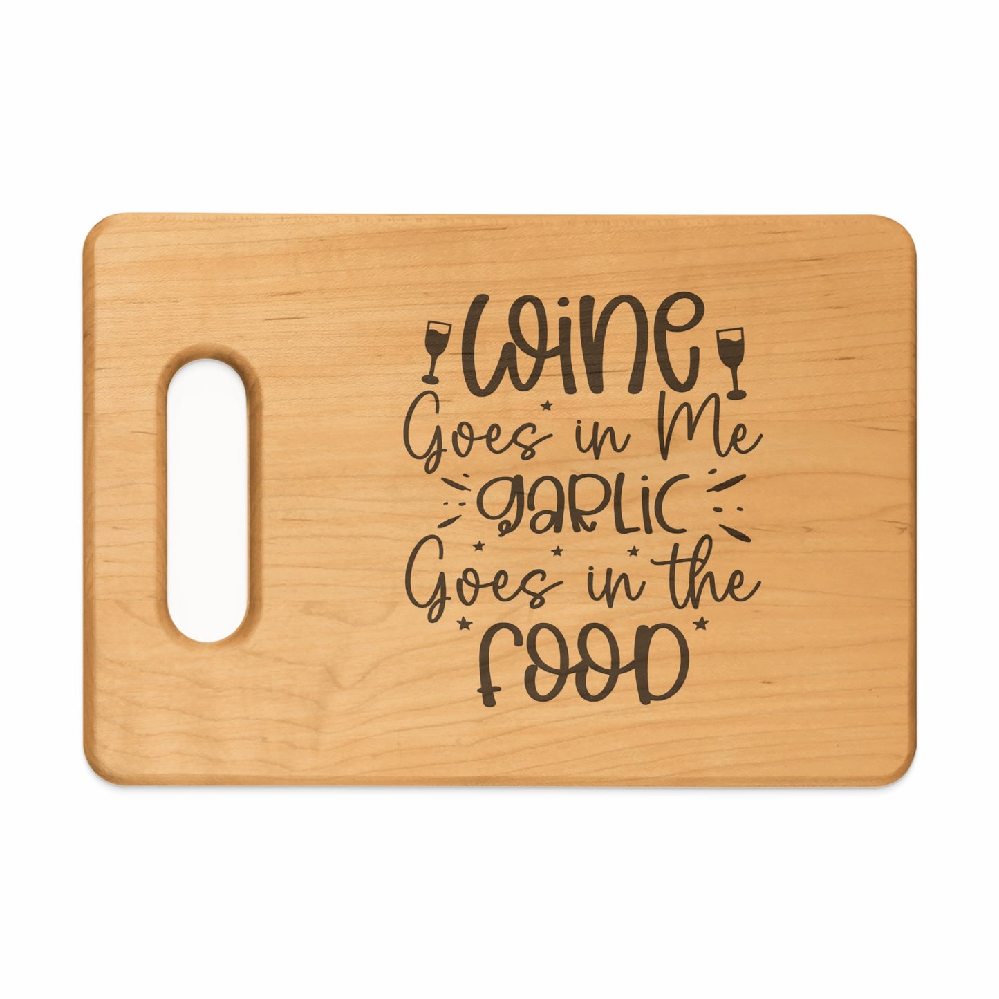 Wooden cutting board with carved text "Wine Goes in Me, Garlic Goes in the Food".