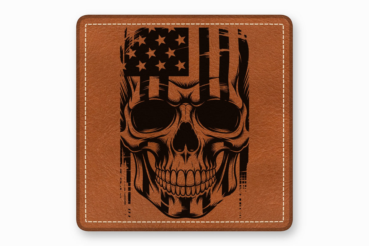 Square brown leather patch featuring a black engraved skull and distressed American flag design.