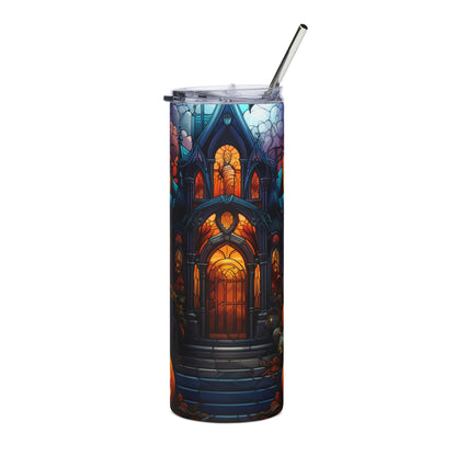 Tumbler with a gothic haunted house stained glass design and a metal straw.