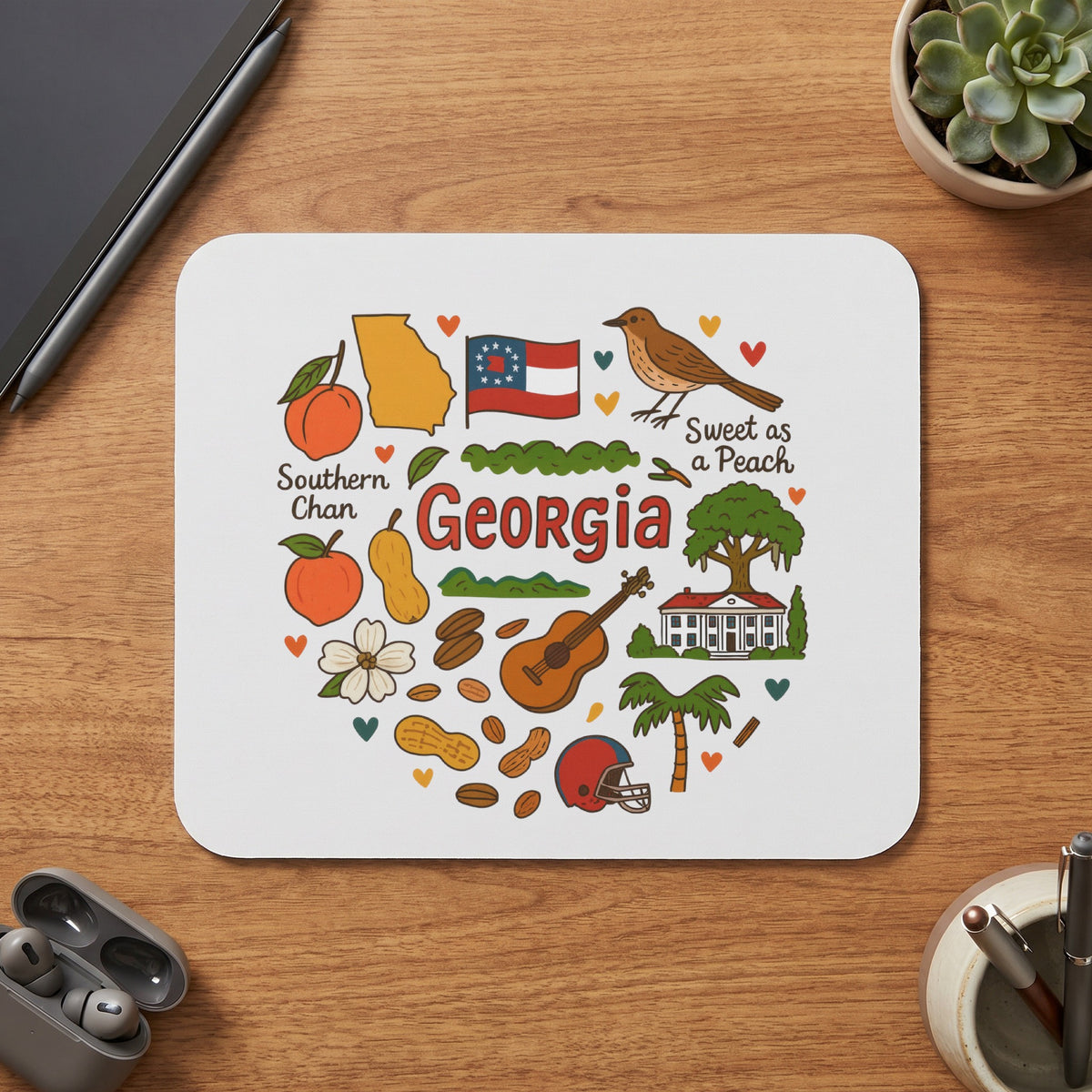Georgia map, flag, bird, house, and other iconic state elements on a white mat.