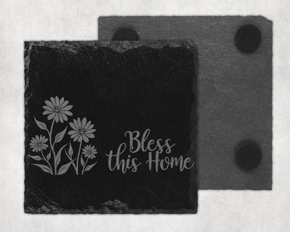 Black slate coaster with etched flowers and "Bless this Home" text.