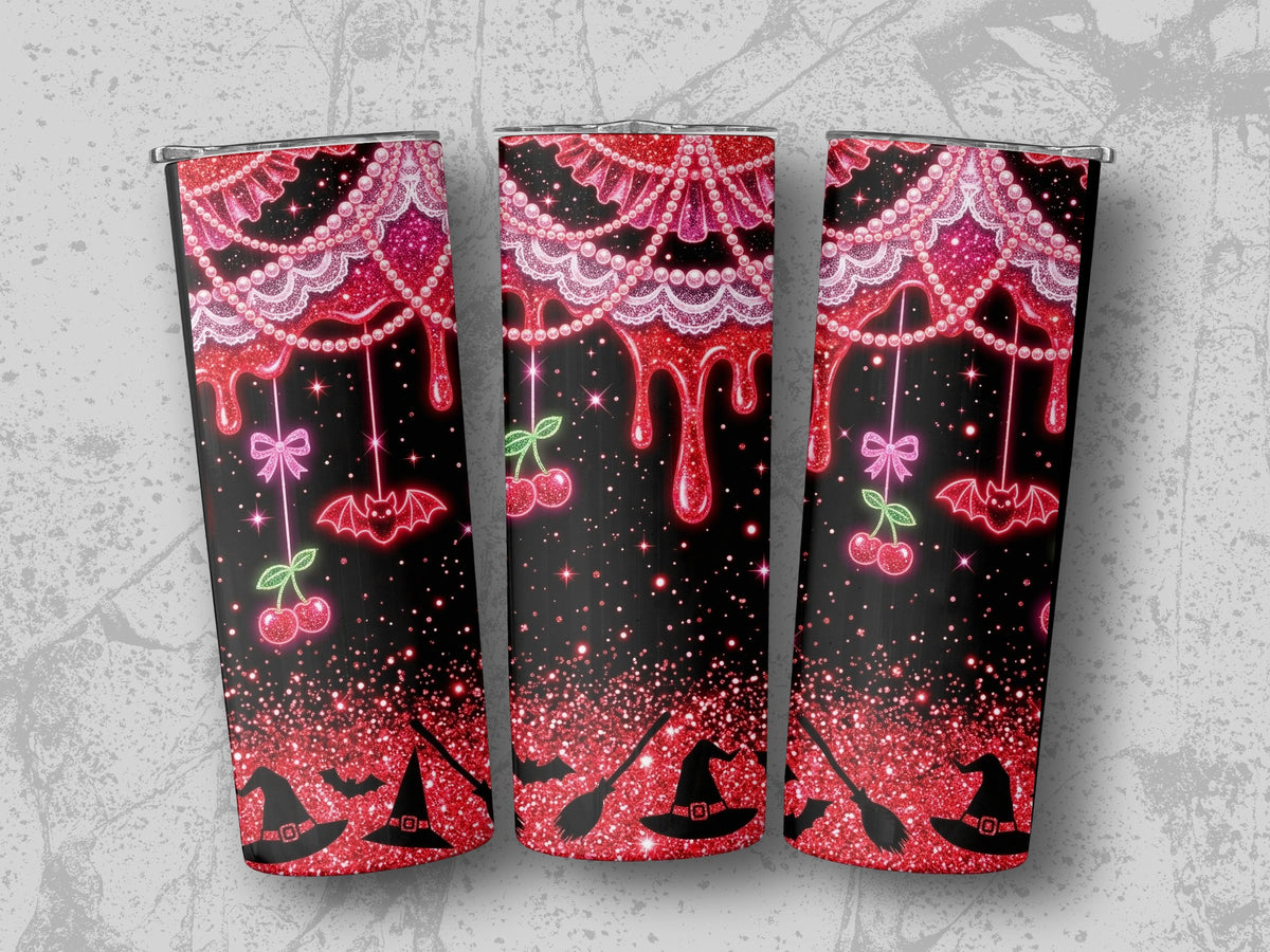 Three tumblers with a glittery red and black Halloween design featuring bats, cherries, and witch hats.