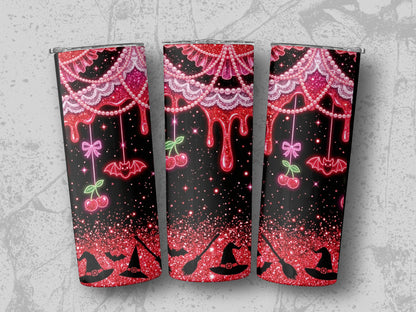 Three tumblers with a glittery red and black Halloween design featuring bats, cherries, and witch hats.