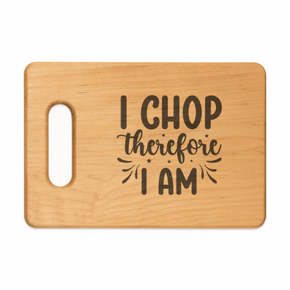 Wooden cutting board with carved text "I CHOP therefore I AM".