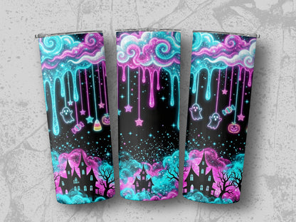 Three tumblers with a Halloween design featuring haunted houses, ghosts, and candy.