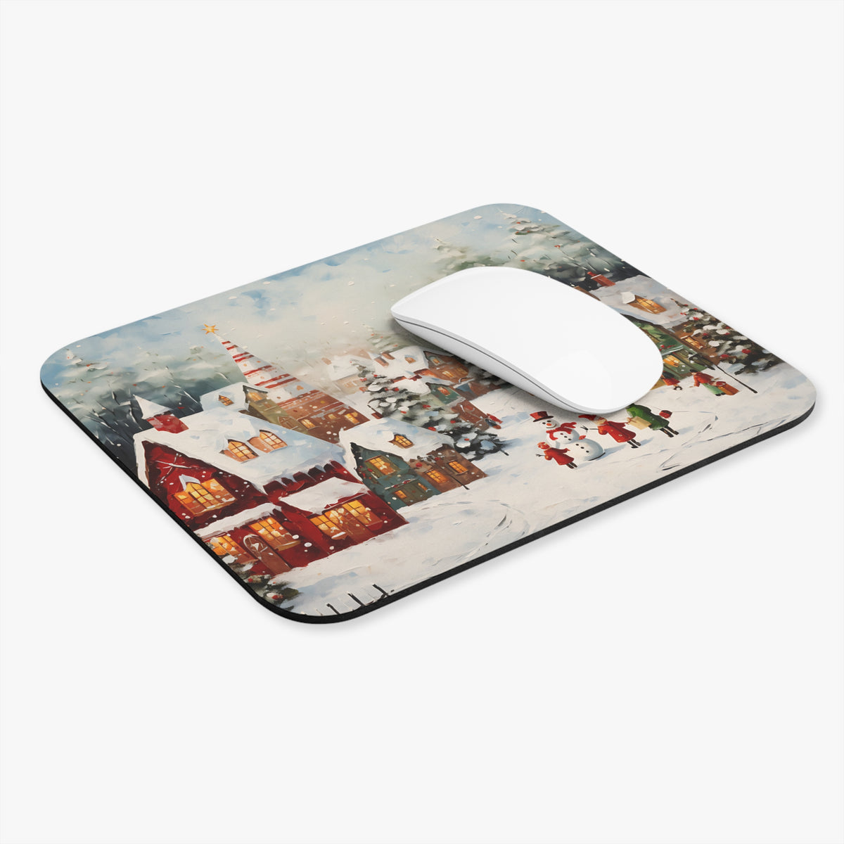 Mousepad with painted winter village scene featuring snow-covered houses and people.