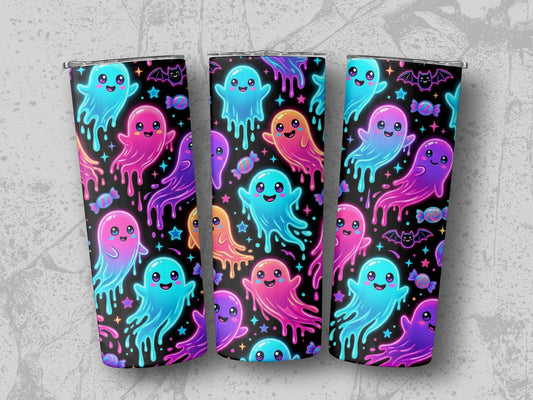 Three tumblers with a neon ghost and candy Halloween pattern on a textured gray background.