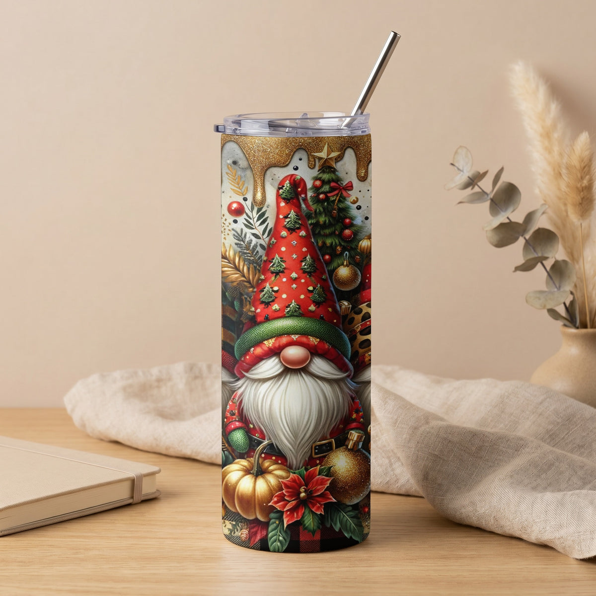 Christmas gnome design tumbler with plaid, poinsettia, pumpkin, and pine tree accents.