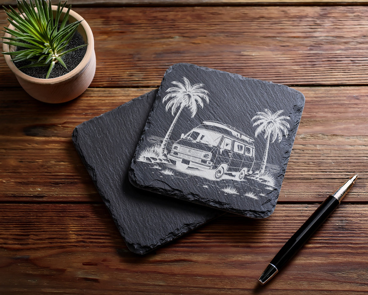 Slate coaster etched with a camper van and palm trees.