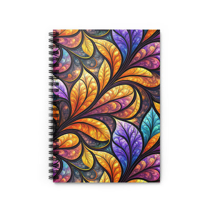 Spiral bound notebook with colorful stained glass leaf pattern.