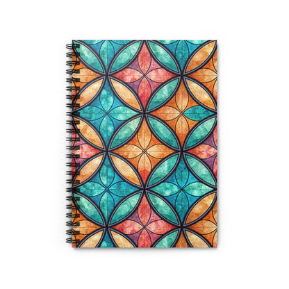 Spiral-bound notebook with a stained-glass pattern in blue, green, orange, and red.