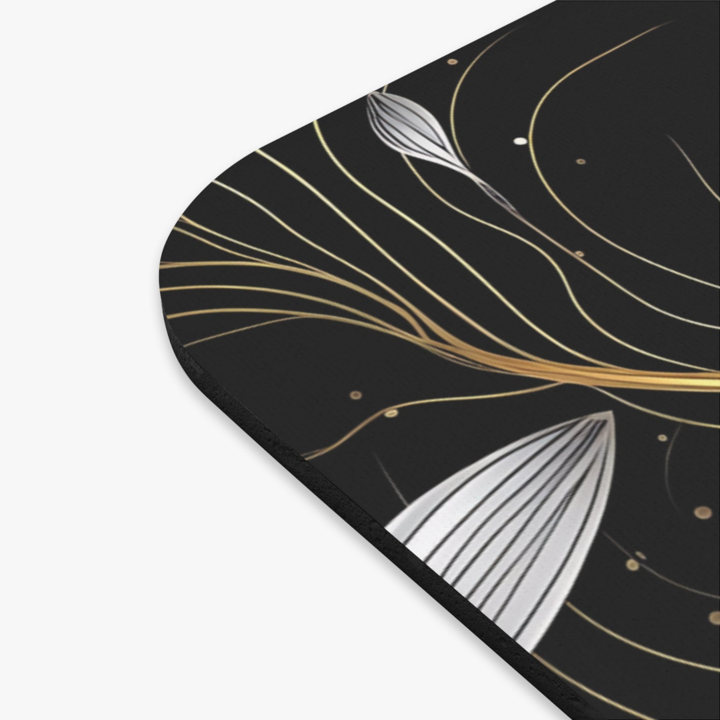 Black mousepad with abstract gold and silver floral line art design.