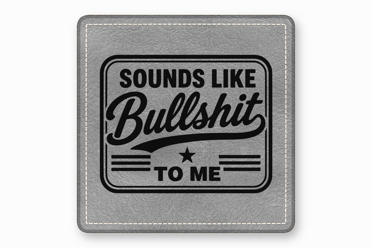 A gray square leather patch with white stitched border features black text reading Sounds Like Bullshit To Me.