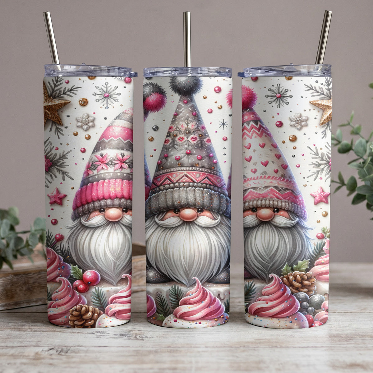 Three tumblers with Christmas gnomes and festive winter decorations.