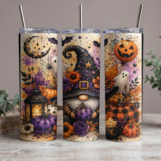 Three Halloween themed tumblers with gnomes, pumpkins, bats, ghosts, and a moon.