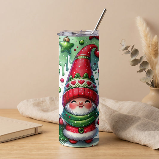 Tumbler with a cheerful gnome wearing a red hat and green scarf, surrounded by Christmas ornaments.