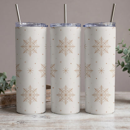 Three white tumblers with a repeating snowflake and dot pattern in beige.