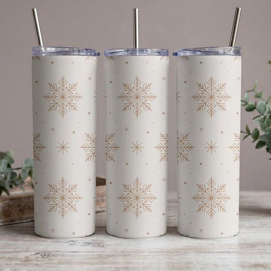 Three white tumblers with a repeating snowflake and dot pattern in beige.