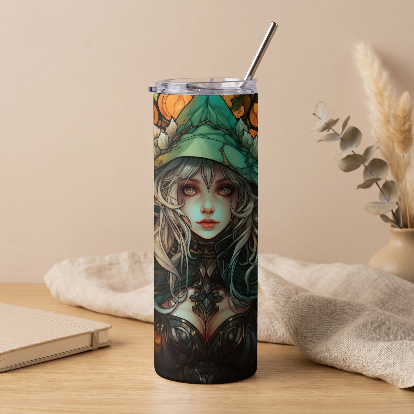 Tumbler featuring a fantasy woman with white hair and a green hat.