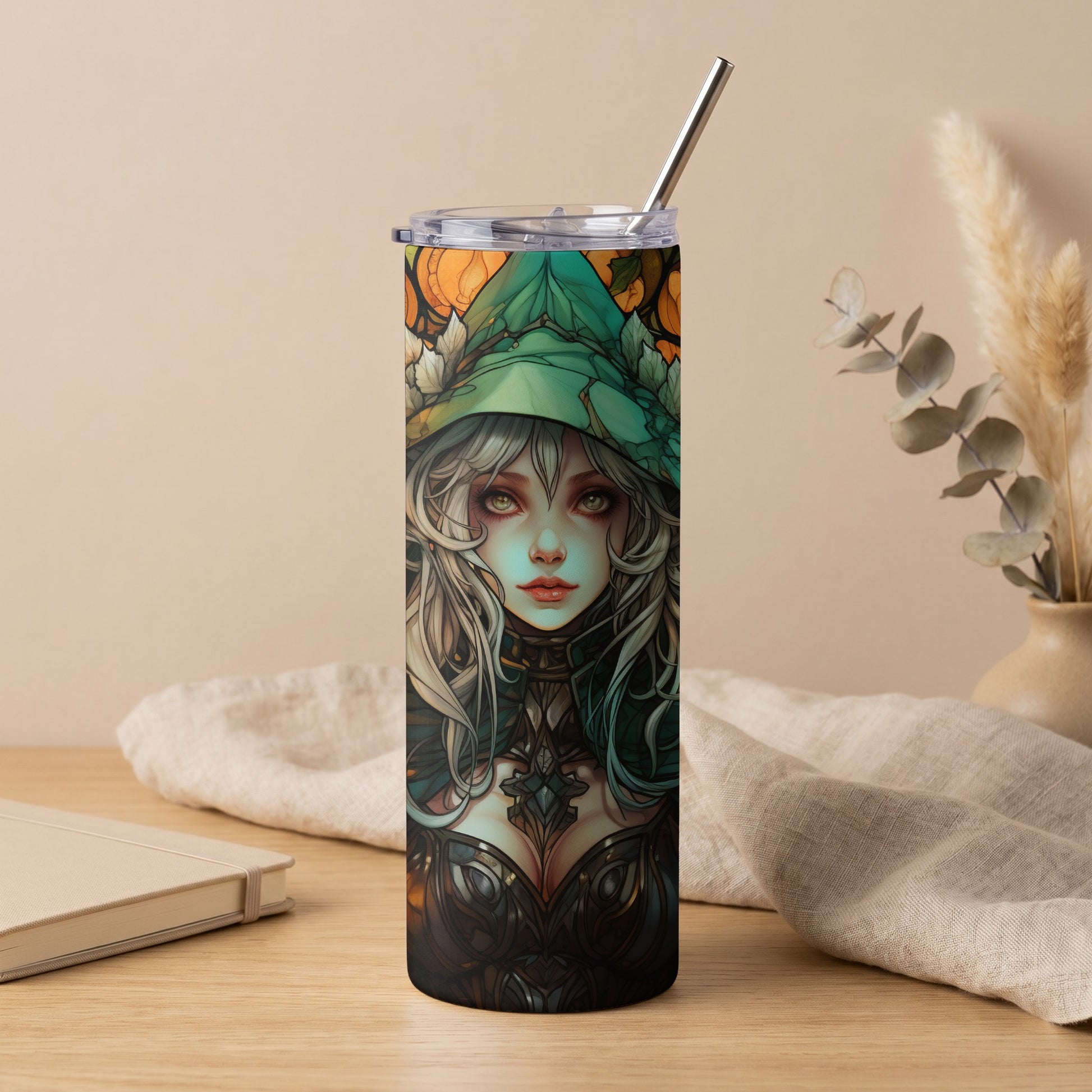 Tumbler featuring a fantasy woman with white hair and a green hat.
