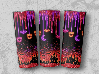 Three tumblers with a Halloween design featuring dripping glitter and spooky silhouettes.