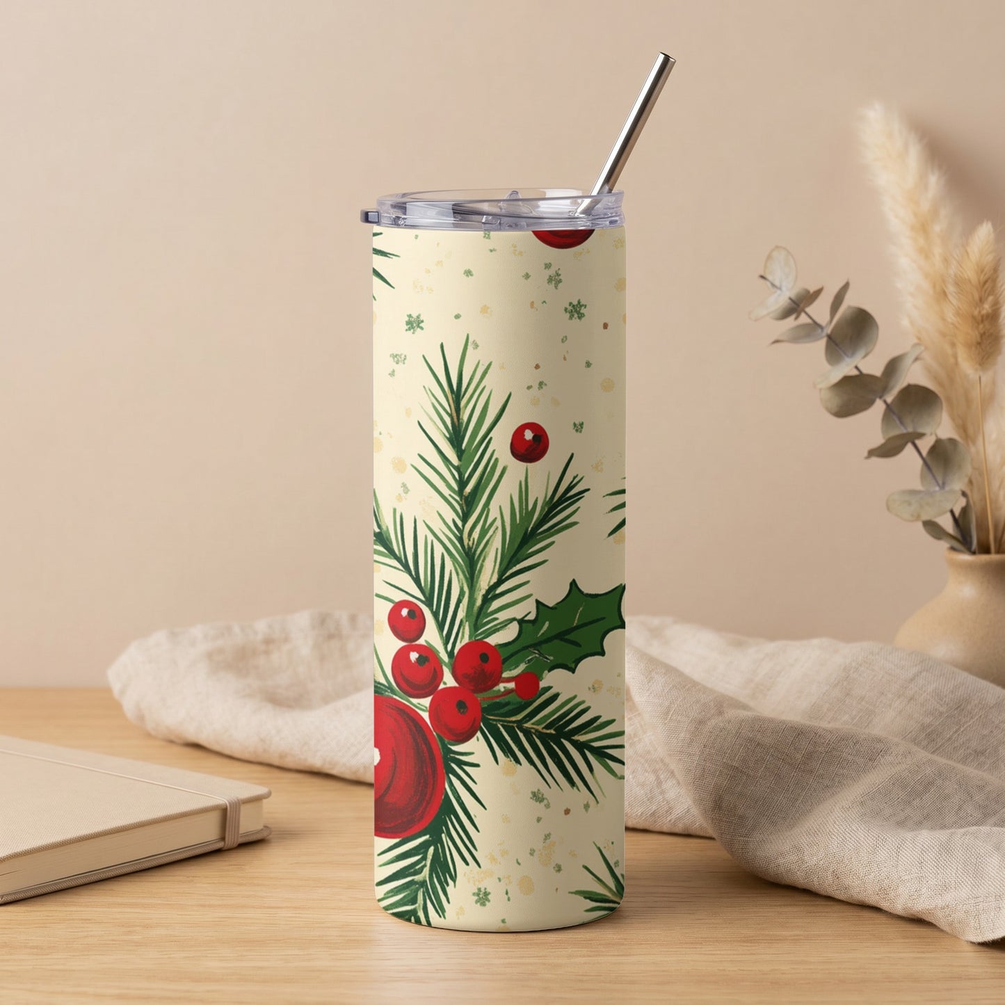 Tall insulated tumbler with a cream background and watercolor holly and berry design.