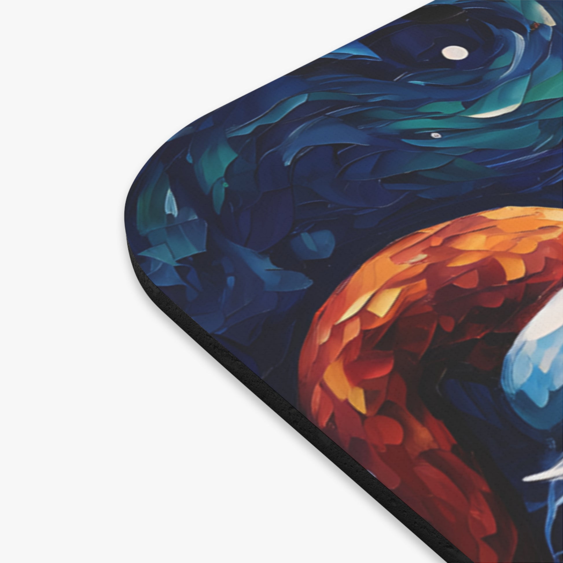 Close-up of a mousepad with a painting of a vibrant parrot and dark blue feathers.