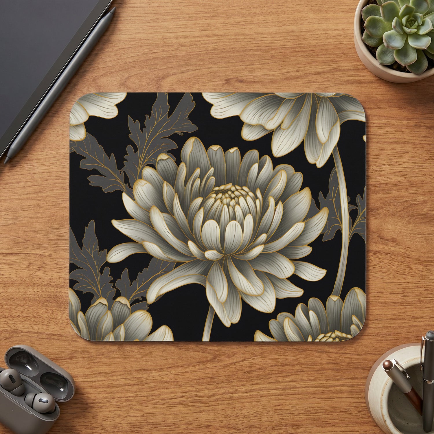 Mousepad with a black background and a detailed white chrysanthemum floral pattern.