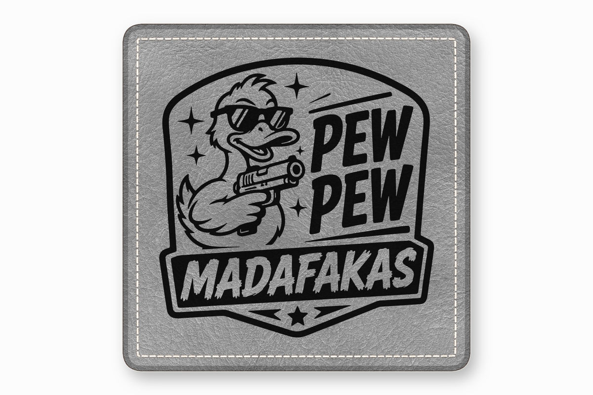 A grey leather square patch featuring a black graphic of a duck wearing sunglasses and holding a handgun, alongside the text Pew Pew Madafakas.