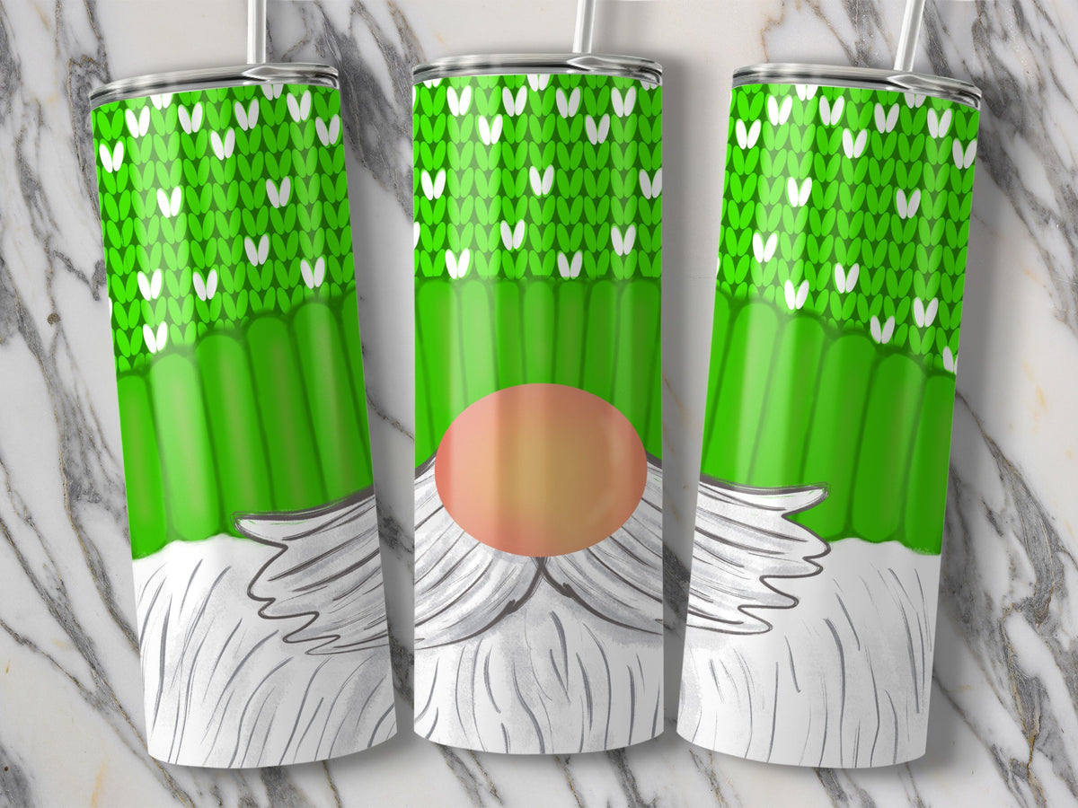 Three tumblers with green knitted pattern, white beards, and peach-colored noses.