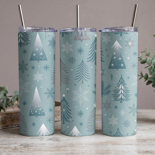 Three tumblers with a blue background and white and gray winter trees and snowflakes pattern.