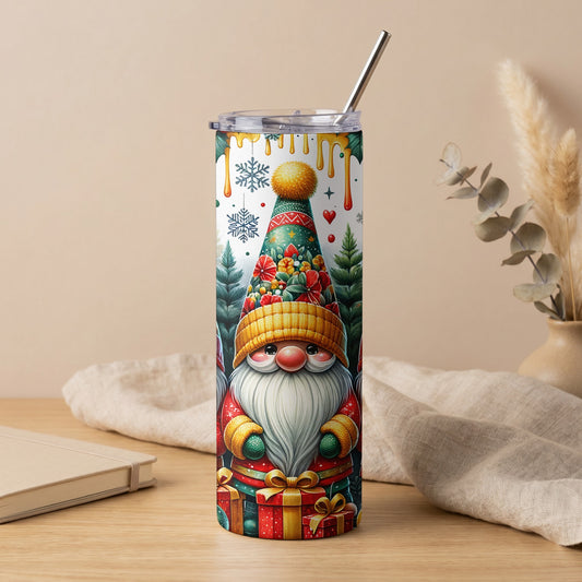 Christmas gnome tumbler with gifts, snowflakes, and evergreen trees.