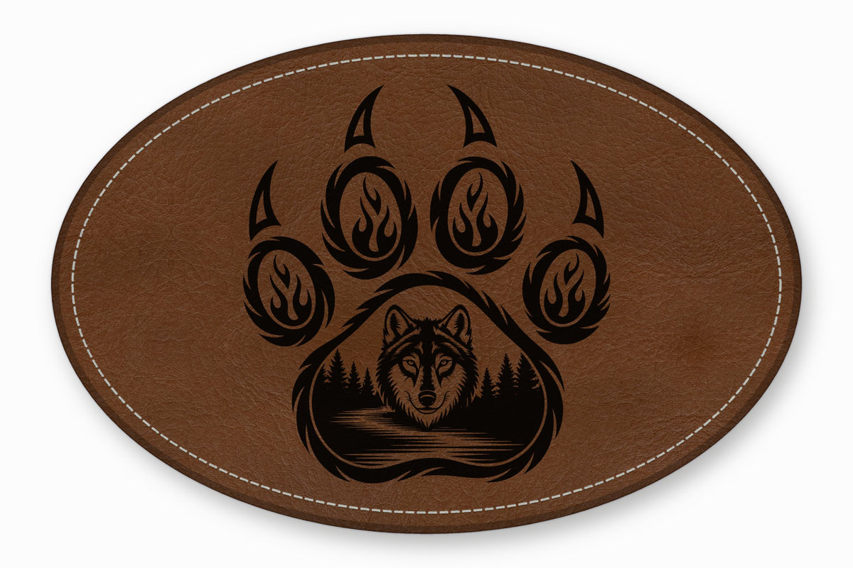 Oval brown leather patch with white stitched border and a black wolf and bear paw graphic.