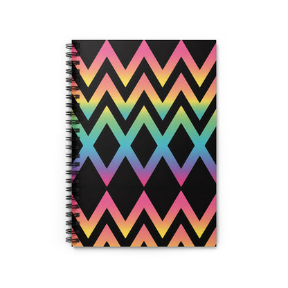 Spiral notebook with rainbow zigzag pattern on black background.