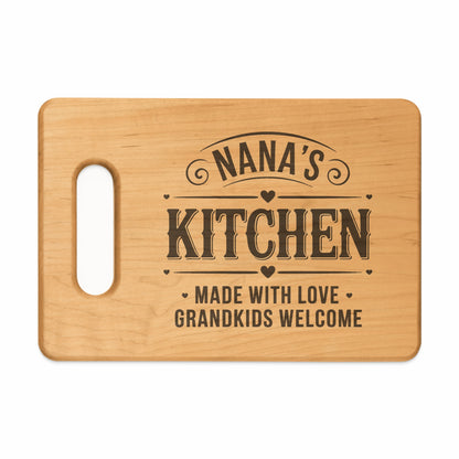 Wooden cutting board with "Nana's Kitchen" and "Grandkids Welcome" text.