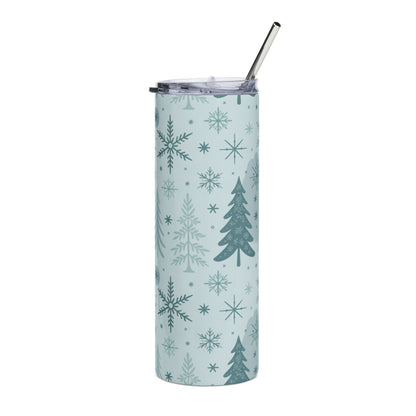 Light blue tumbler with snowflakes and Christmas trees, with a metal straw.