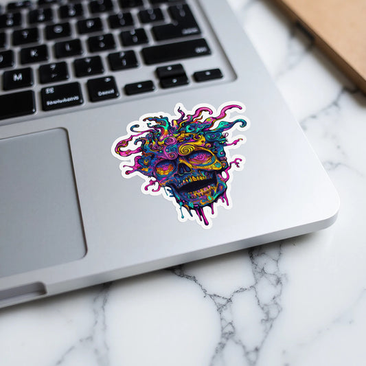 Psychedelic skull sticker with colorful swirling designs on laptop keyboard.