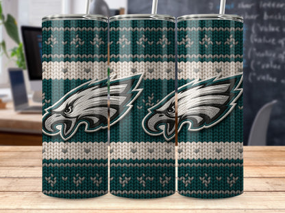 Philadelphia Eagles logo on a teal, white, and gray knitted pattern tumbler.