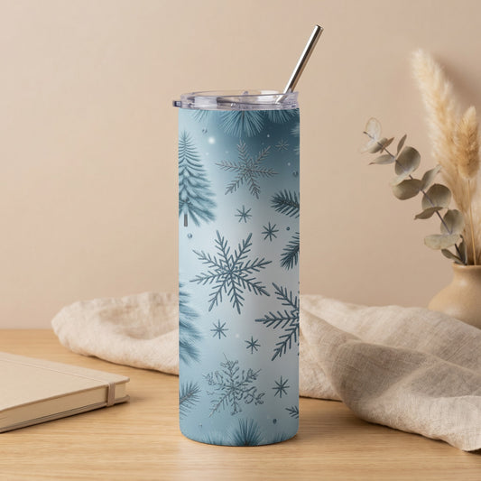 Blue tumbler with snowflakes and pine branches, silver straw.