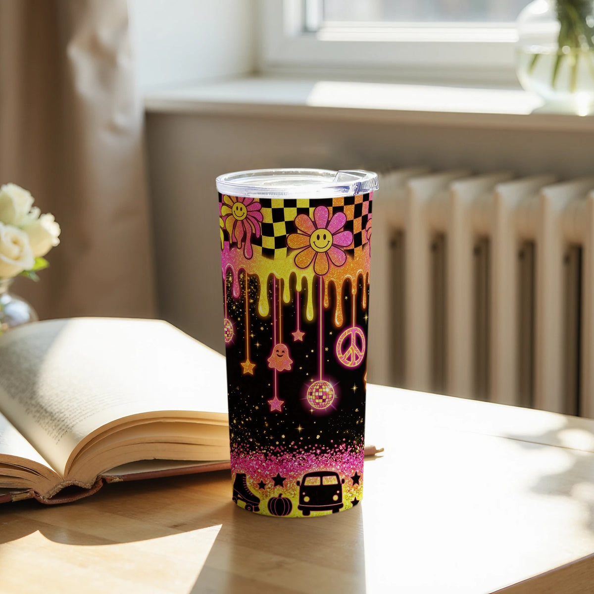 Tumbler with retro smiley flowers, peace signs, disco balls, and a van graphic.