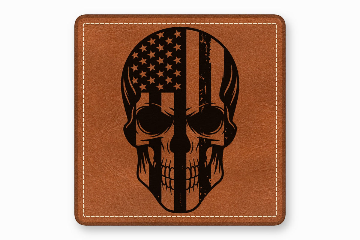 Square brown leather patch with white stitched border and a black skull design featuring an American flag.